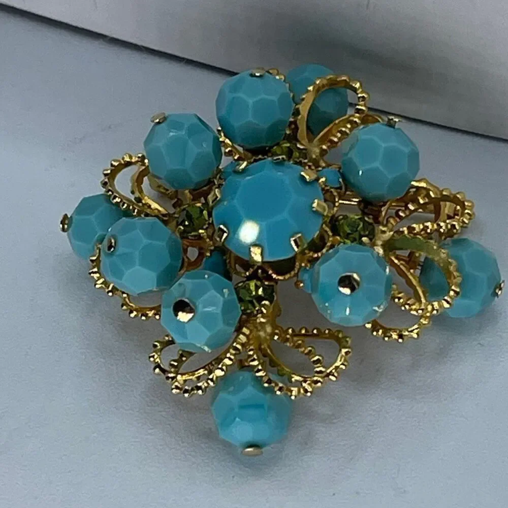 Vintage Made in Austria light blue green AB beads.
